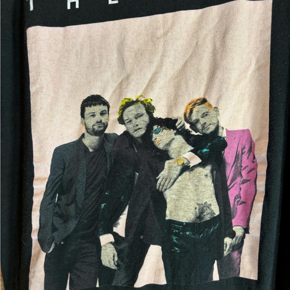 1975 large women’s black graphic vintage preowned tshirt
